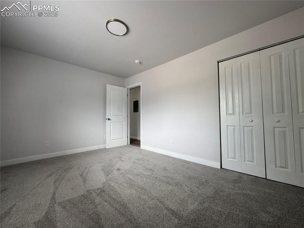 Image 5 of 17: Upstairs Unit Bedroom 1
