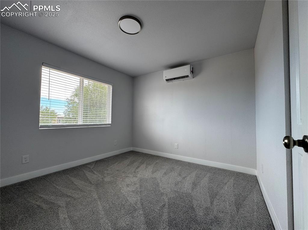 Image 6 of 17: Upstairs Unit Bedroom 2