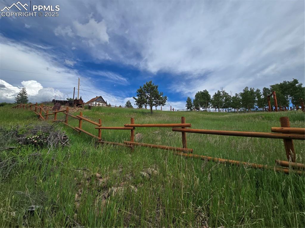 Image 4 of 10: View of yard with a rural view