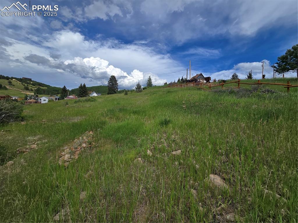 Image 7 of 10: View of yard with a rural view