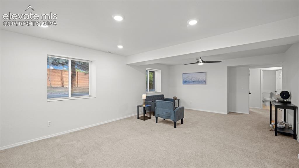 Image 26 of 46: Spacious room with recessed lighting, light-toned carpeting, a ceiling fan,