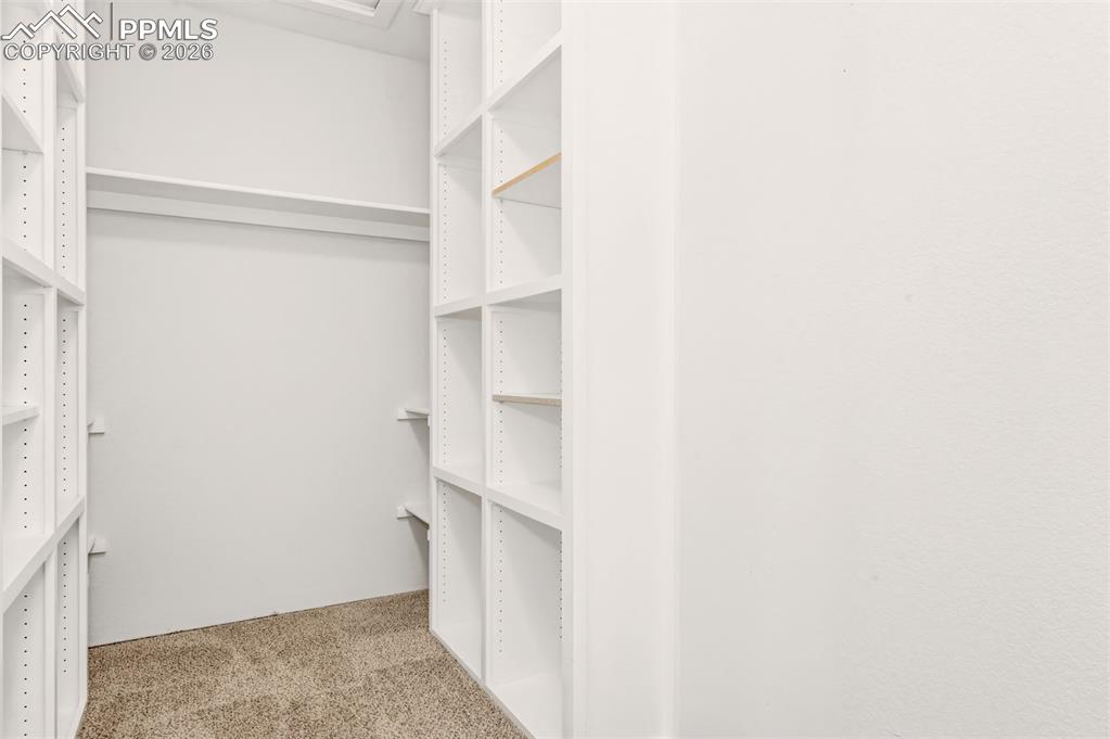 Image 24 of 43: Walk in Closet