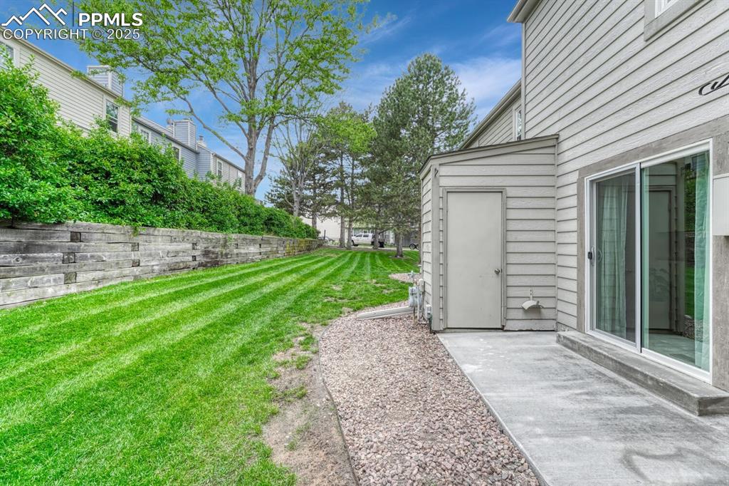 Image 37 of 50: Back yard and storage shed