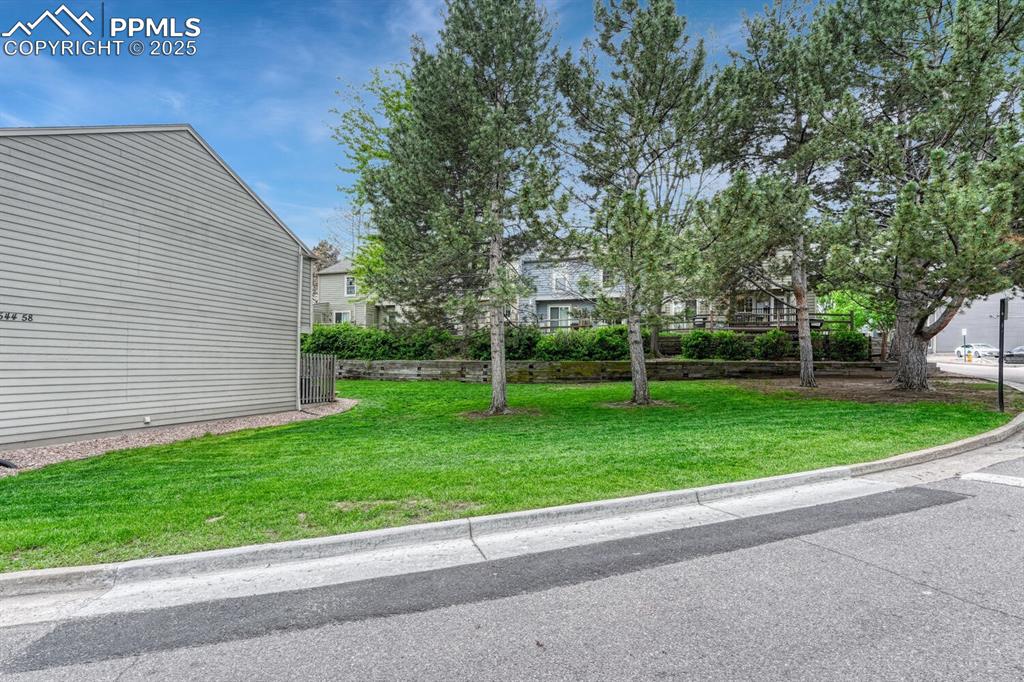 Image 44 of 50: View of grassy yard