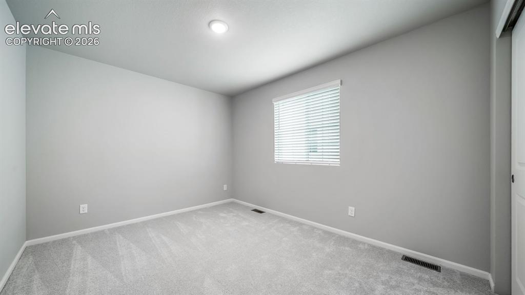 Image 31 of 34: Neutral tone walls with soft gray carpeting
Photos of a Model Home