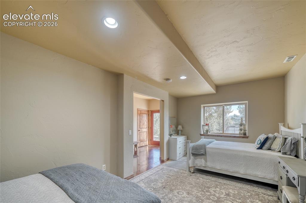 Image 40 of 50: Bedroom