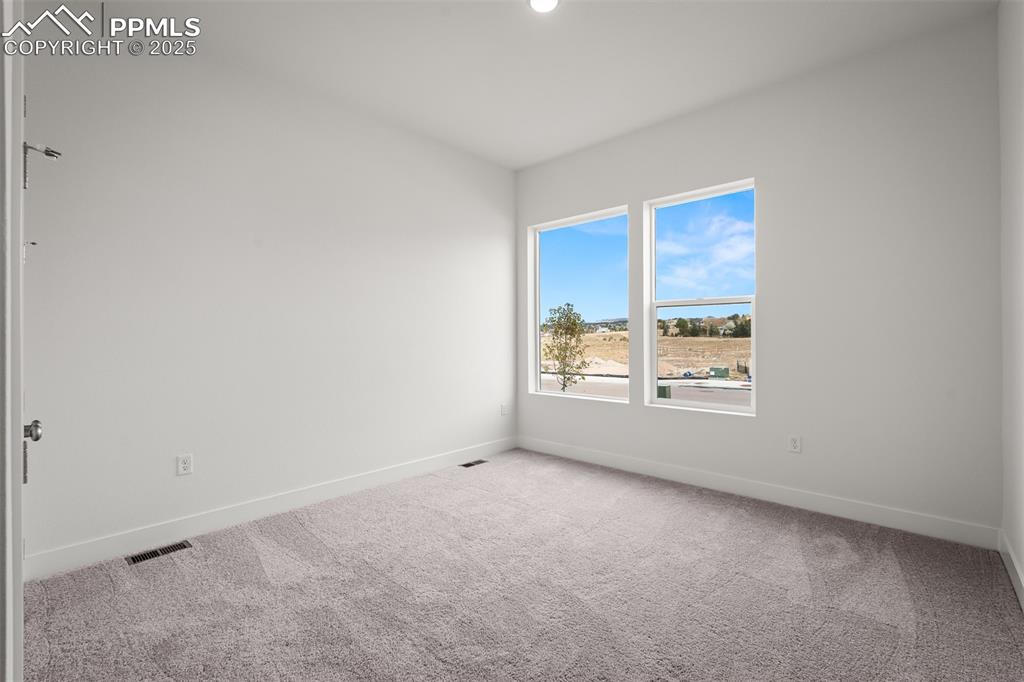 Image 23 of 38: Bedroom