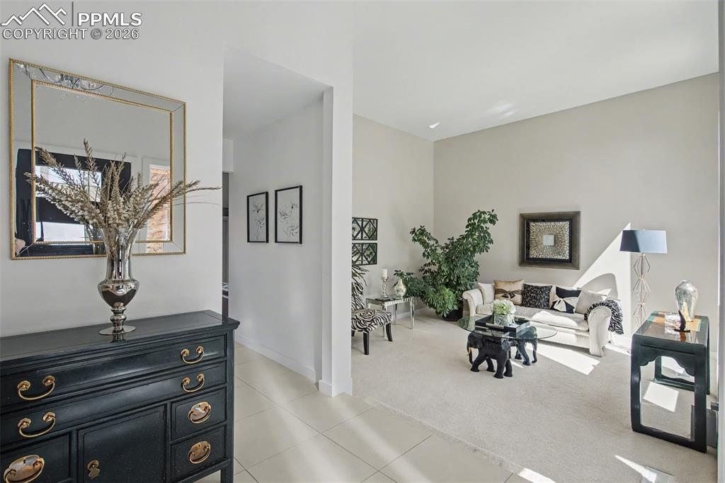 Image 14 of 50: entry looking into formal living room