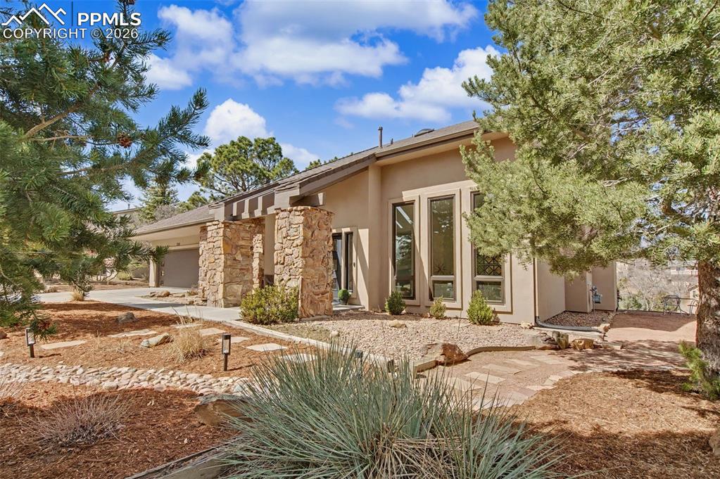 Image 2 of 50: zero scaped front yard