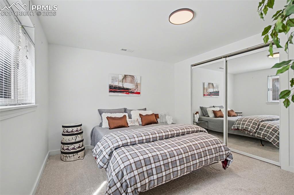 Image 33 of 50: basement bedroom