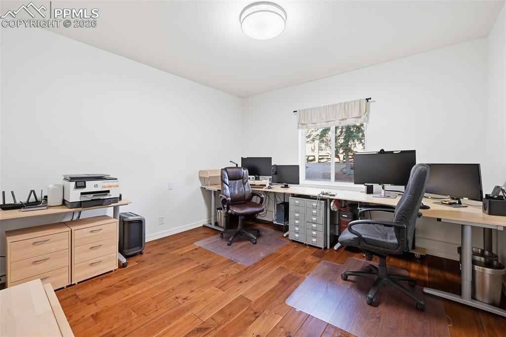 Image 17 of 48: Office/Bedroom with adjoining bathroom
