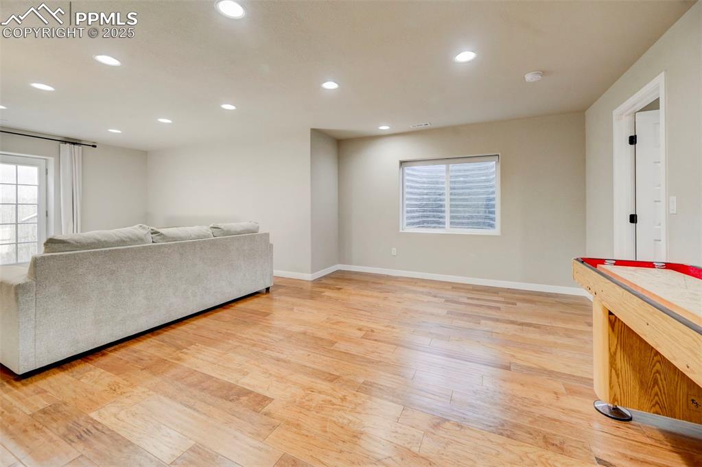 Image 43 of 50: Living room with healthy amount of natural light, recessed lighting, and li