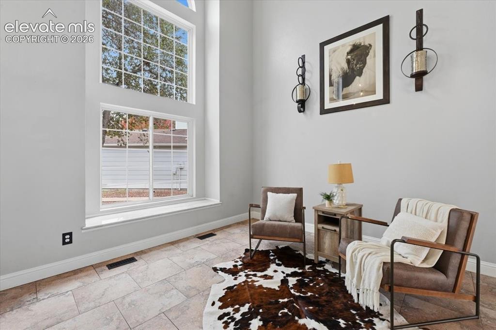 Image 10 of 50: Another view of the front entry sitting room!