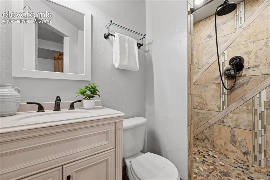 Image 39 of 50: Attached bath to bedroom #4!