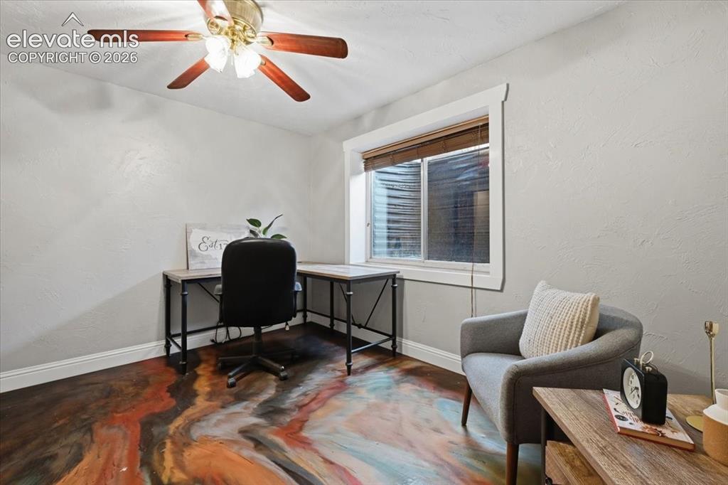 Image 41 of 50: Another view of bedroom #5 with concrete flooring!