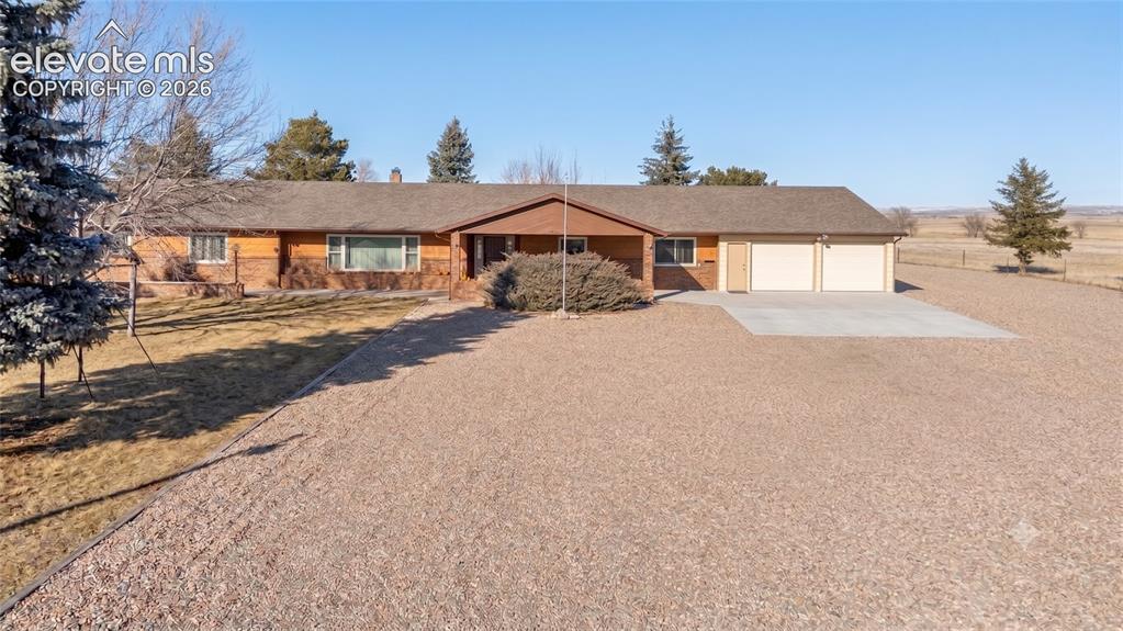 Image 19 of 20: Front of home with covered front porch