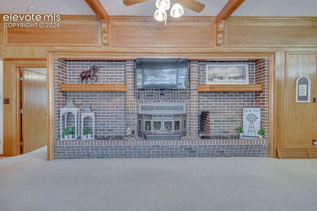 Image 8 of 20: Gorgeous brick fireplace
