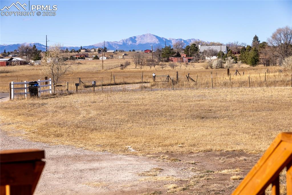 Image 42 of 49: View of yard featuring a mountain view and a view of rural / pastoral area