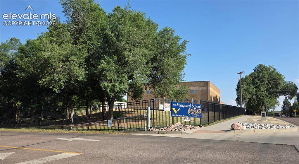 Image 9 of 9: Gate access to The Vanguard High School.