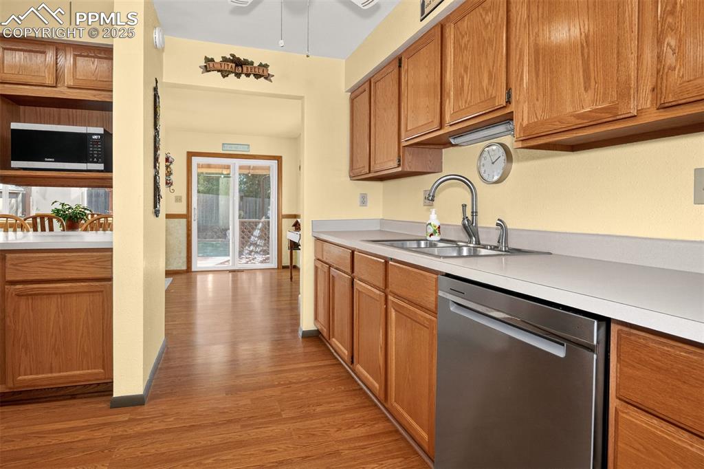 Image 10 of 36: Stainless steel refrigerator and dishwasher