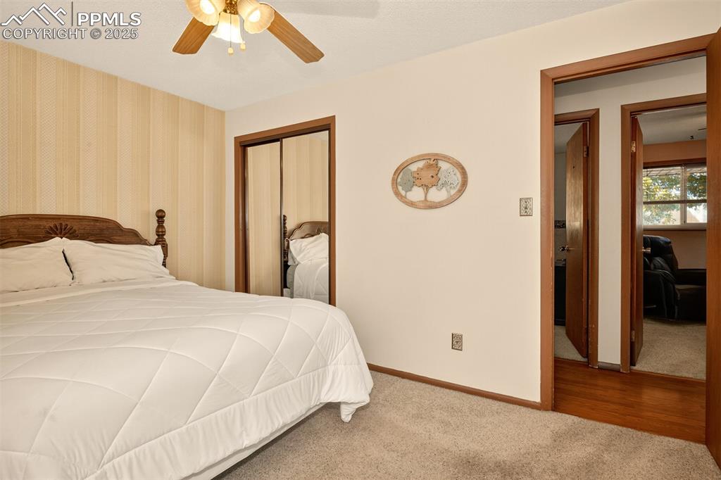 Image 13 of 36: Sliding, mirrored doors for the closet