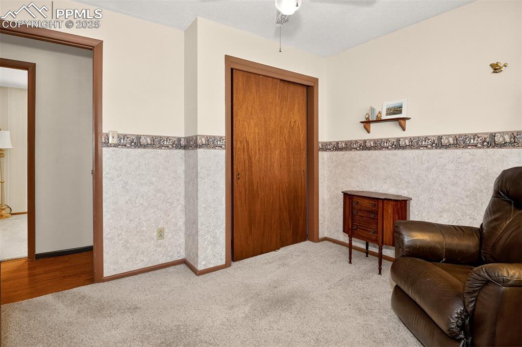 Image 16 of 36: Second main level bedroom