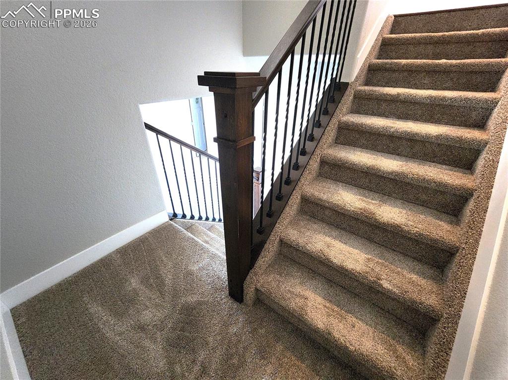 Image 26 of 50: Staircase to Walkout Basement
