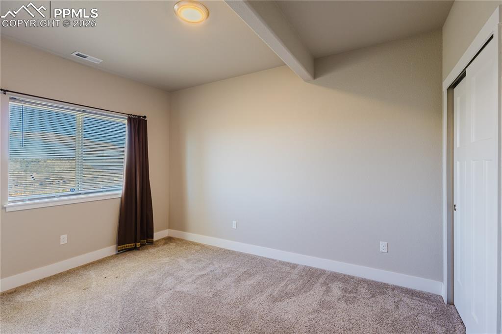 Image 35 of 50: Basement Bedroom