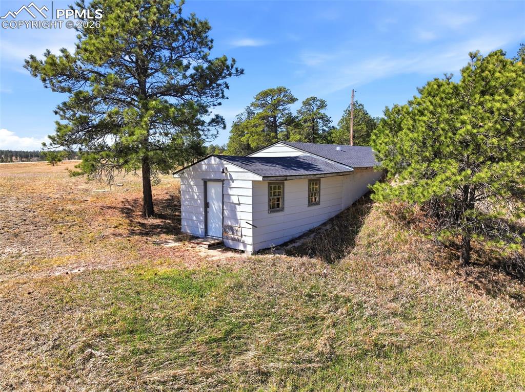 Image 42 of 50: Front of Out Building