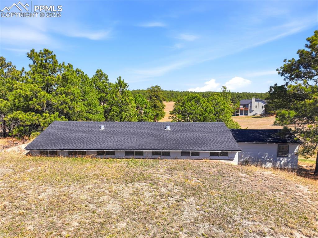 Image 43 of 50: Side of Out Building