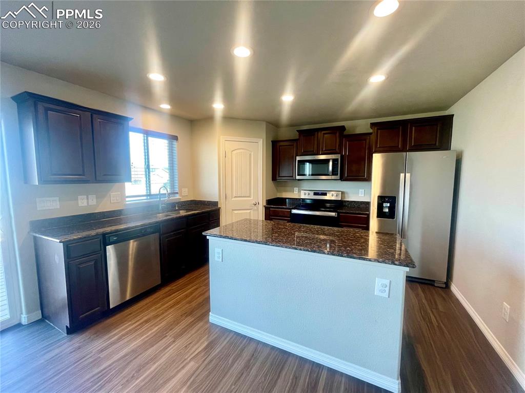 Image 2 of 15: Kitchen with granite countertops
