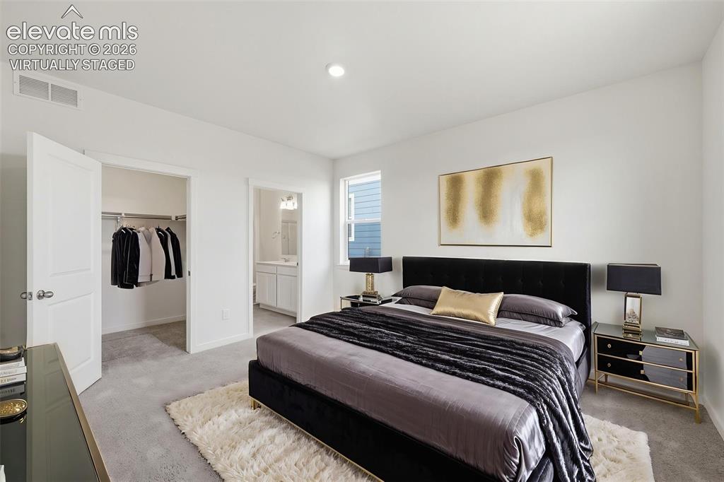 Image 9 of 23: Virtually Staged Photo. Neutral-toned carpeting throughout