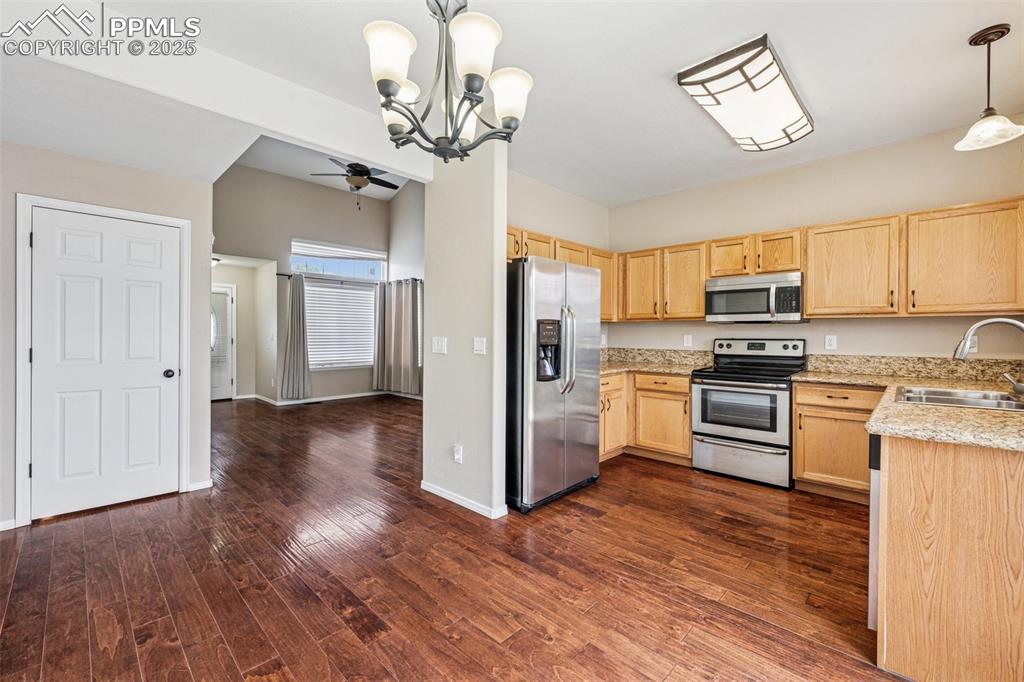 Image 10 of 39: View from Dining area to Kitchen