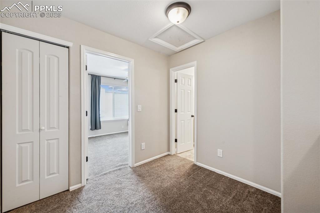 Image 20 of 39: Upstairs landing with closet, 3rd bedroom and full bath