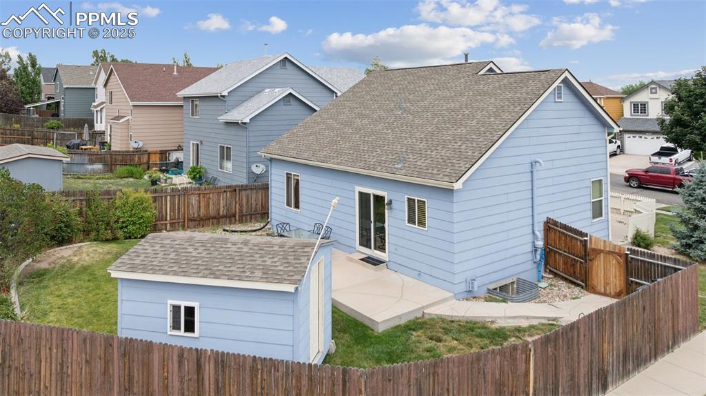 Image 36 of 39: Arial view of private fenced back yard