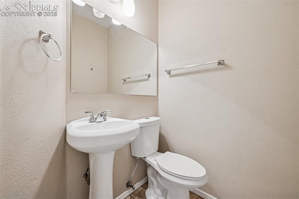 Image 8 of 39: Main Level Powder Bath