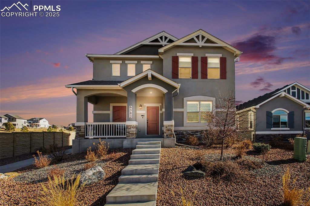 Image 20 of 20: Twilight view of front of home