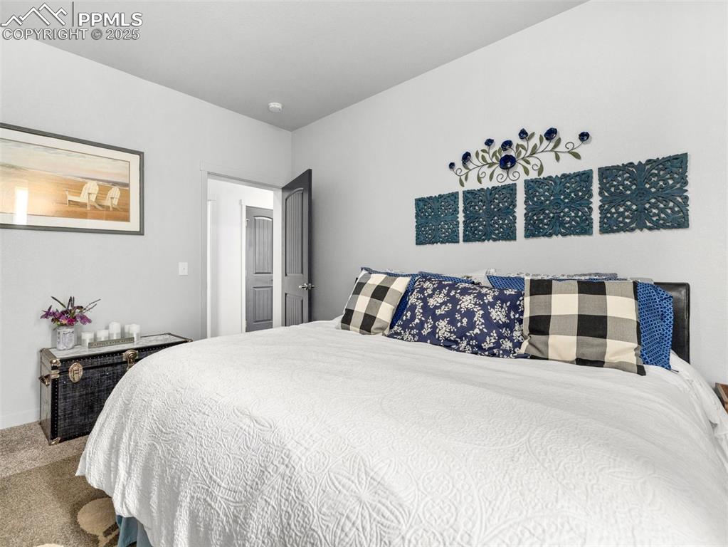 Image 11 of 25: View of carpeted bedroom
