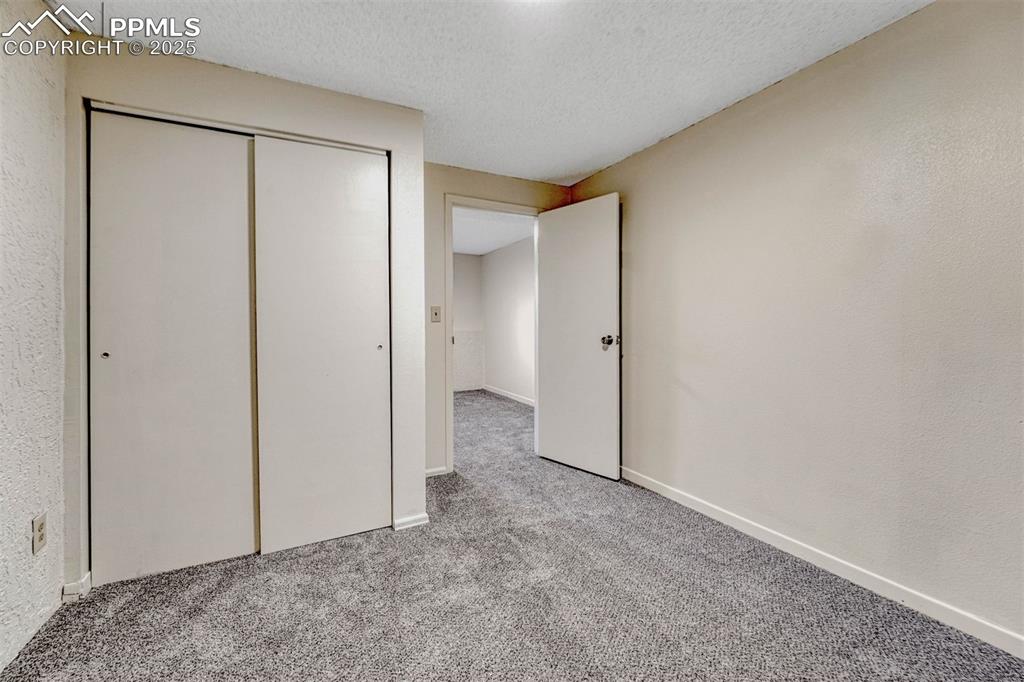 Image 20 of 27: Bedroom