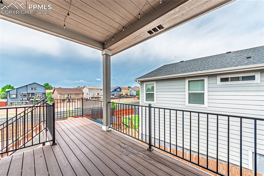 Image 22 of 39: Wooden deck featuring a residential view