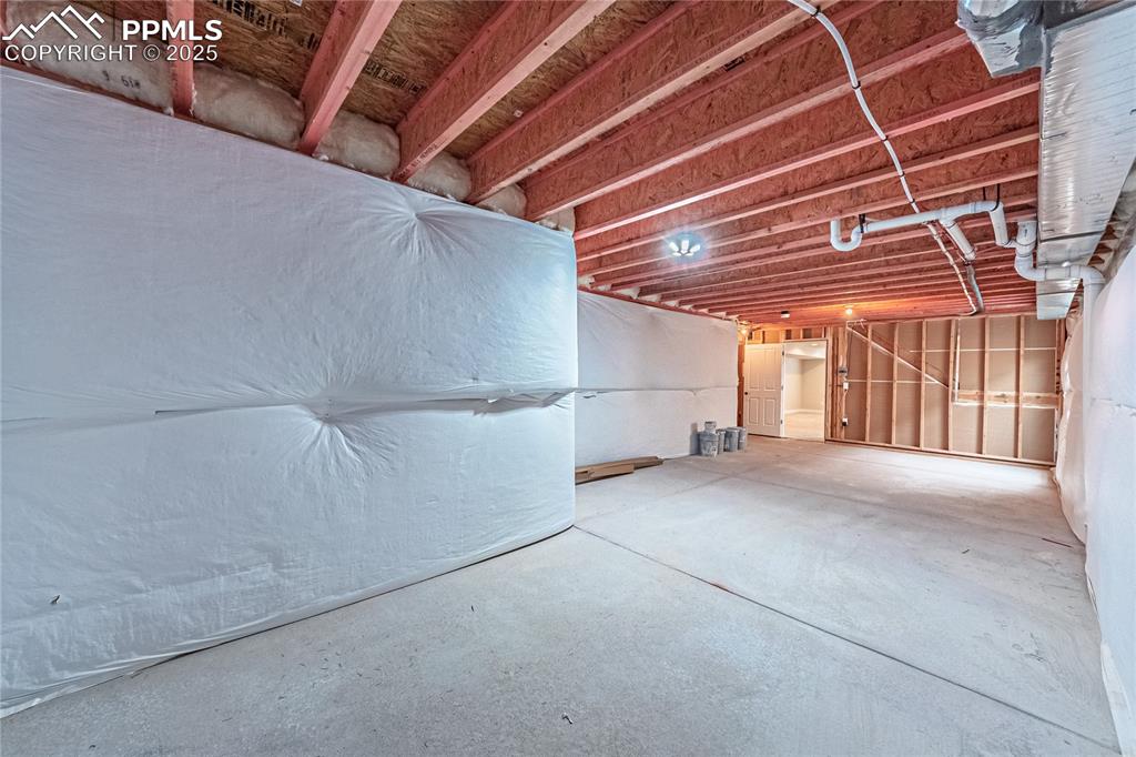 Image 30 of 39: View of unfinished below grade area