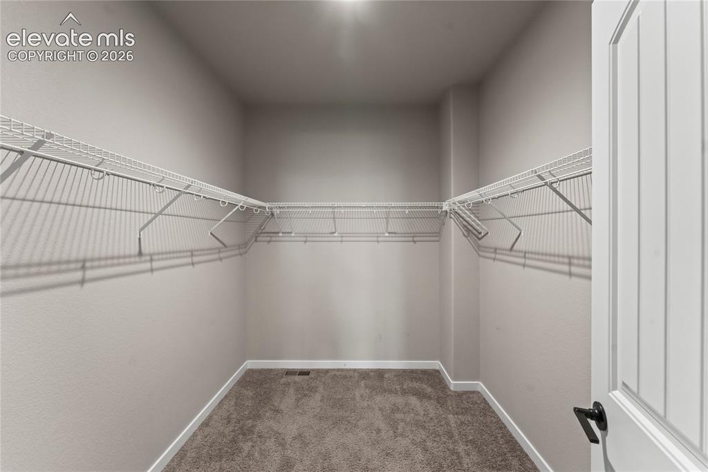 Image 31 of 50: Walk-In Closets