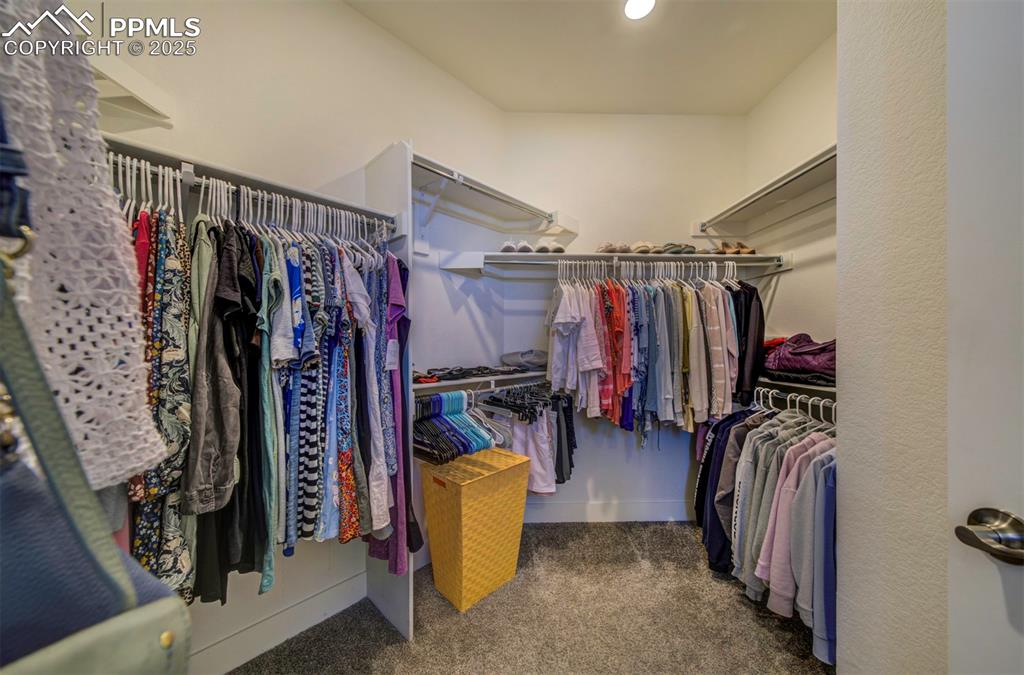 Image 35 of 50: Walk-in Primary Closet