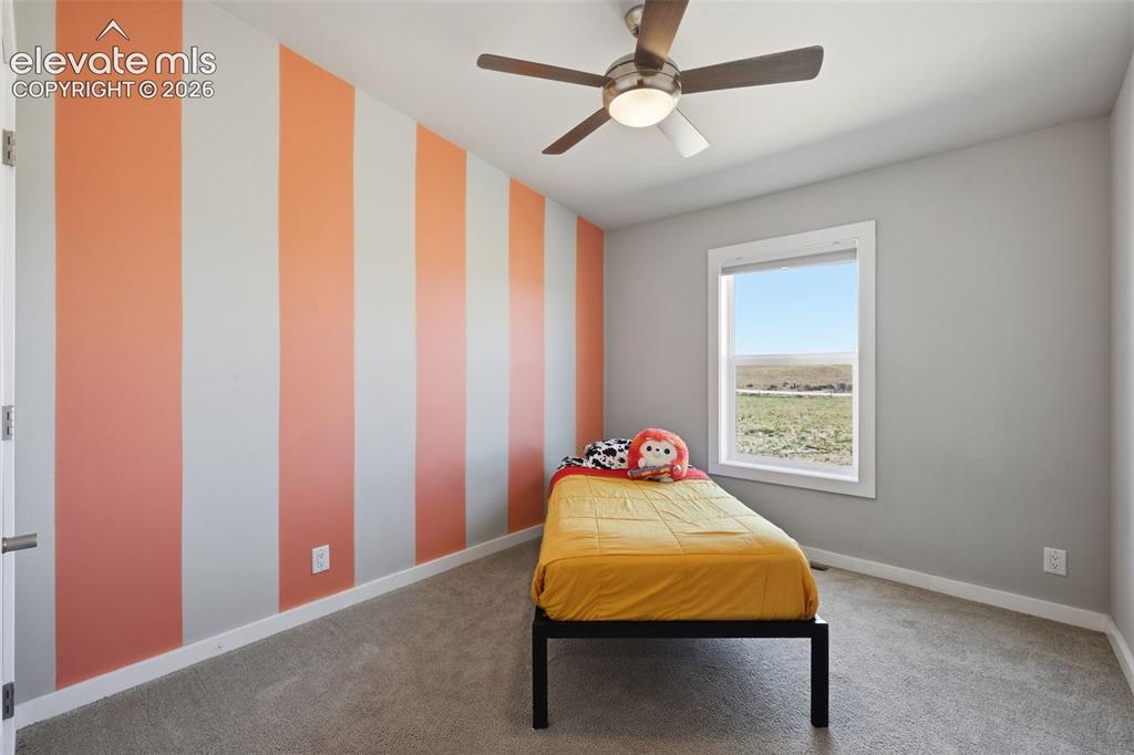 Image 15 of 27: Main level secondary bedroom