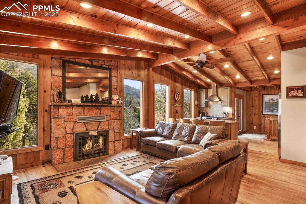 Image 5 of 49: Open Concept Great Room with Vaulted Beamed Ceilings