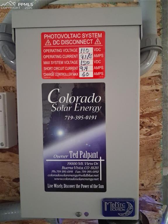 Image 10 of 21: Solar panel equipment in a steel frame building.