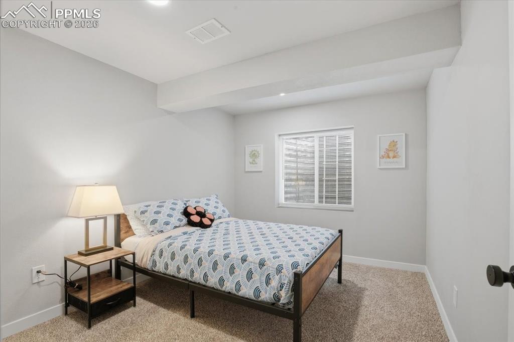 Image 29 of 40: Bedroom featuring carpet flooring and recessed lighting