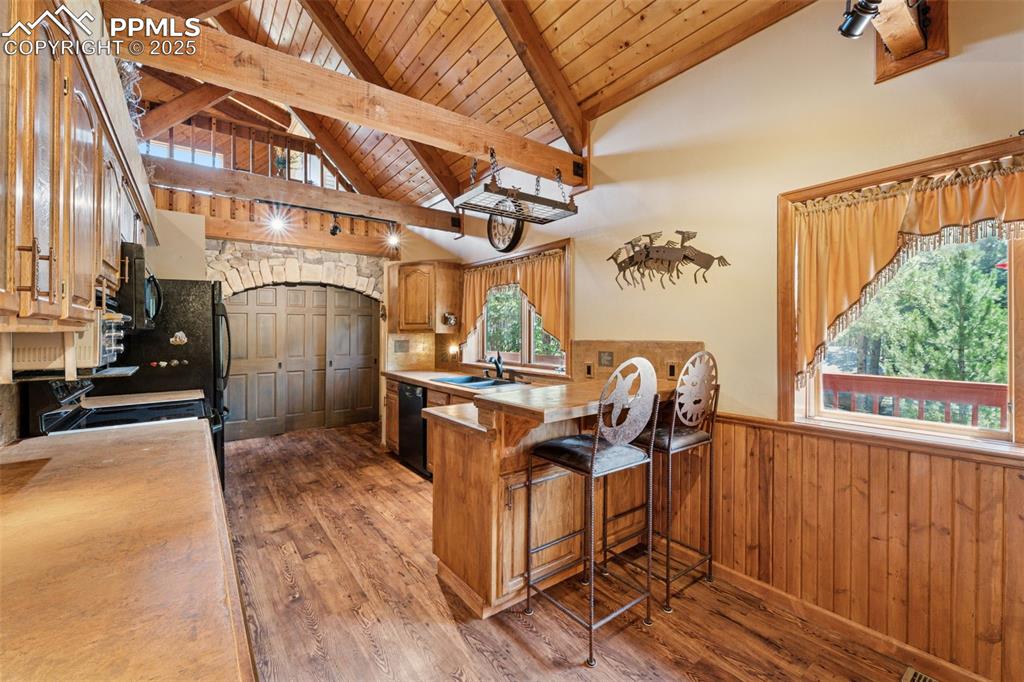 Image 12 of 47: Plenty of space and a walkout to the back porch