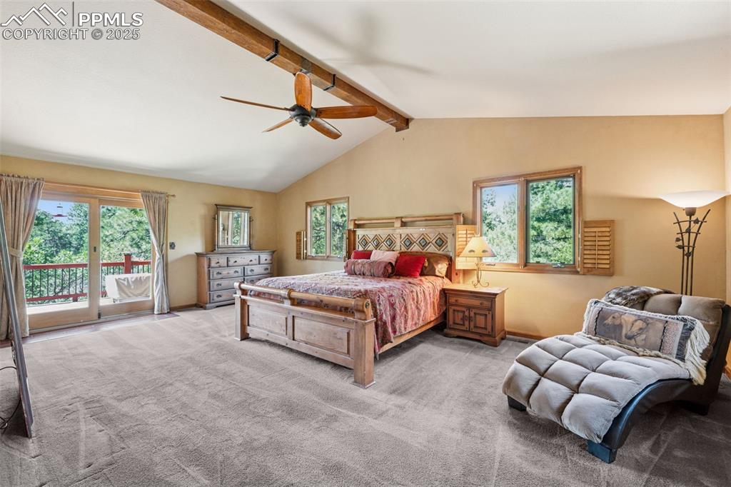 Image 17 of 47: Master with a walkout and views of Pikes Peak off the master porch