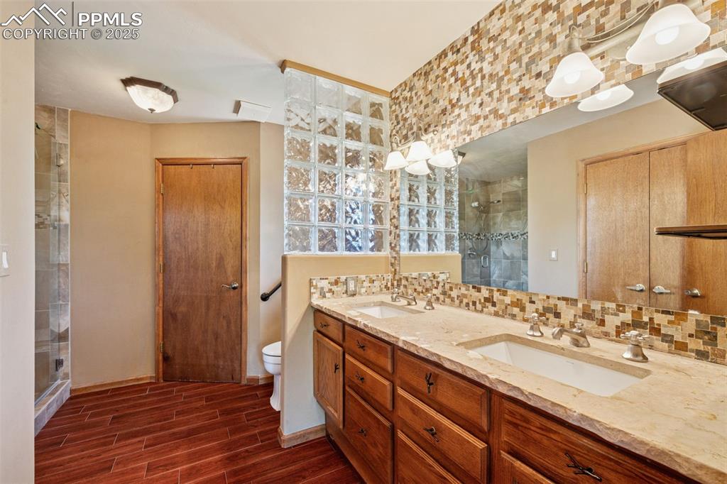 Image 19 of 47: Massive Master Bath with an attached Laundry Room